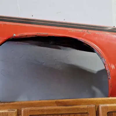 Sale Photo Thumbnail #329: 1971 Dodge Challenger Orange Front Right Fender with Double Stripe – Estate Sales Warehouse (GR)