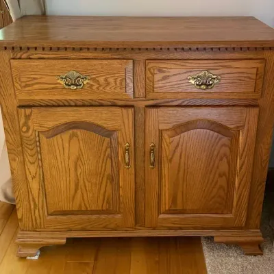 Vintage Oak Wood Two Drawer Storage Cabinet with Double Doors & Decorative Brass Tone Hardware - Lake Odessa Off-Site