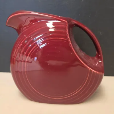 Fiestaware Burgundy Disk Pitcher