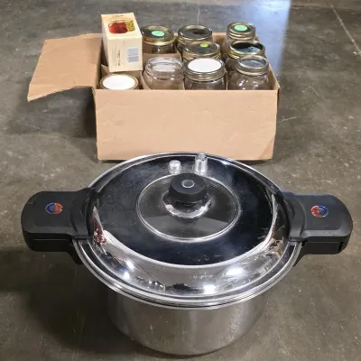 Sale Photo Thumbnail #259: Waterless, Greaseless  Pressure Cooker with Box of Mason Jars and Lids