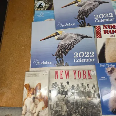 Large Collection of Calendars from Various Years and Themes