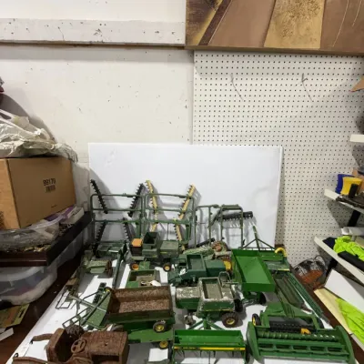 Sale Photo Thumbnail #316: Large John Deere Farm Toy Collection Tractors, Combines, Implements & Equipment – Estate Sales Warehouse (GR)