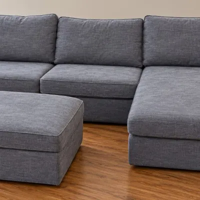Dark Grey Sectional Sofa with Chaise Lounge and Matching Footstool