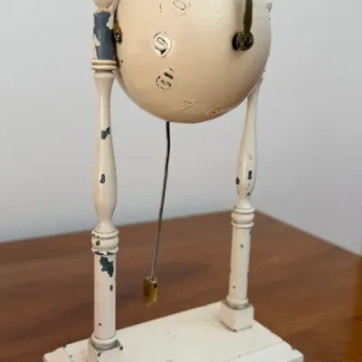 Vintage Style Cream Metal Globe Clock with Pendulum & Decorative Column Stand - Lake Odessa Off-Site