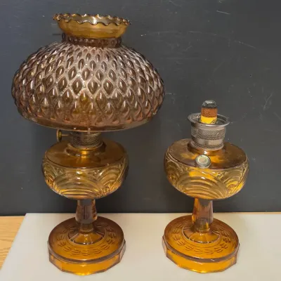 2 Vintage Amber Glass Oil Lamps - One with Shade