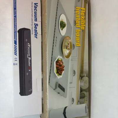 White Automatic Vacuum Sealer and Blue Flexible Heating Mat