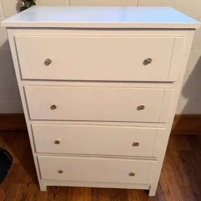 White Painted Wooden 4-Drawer Dresser Chest of Drawers with Decorative Knobs - Lake Odessa Off-Site