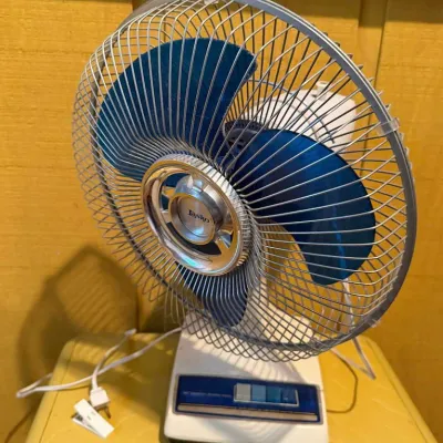 Vintage Lasko Oscillating Table Fan with Blue Blades, Metal Cage & Push Button Controls - Lake Odessa Off-Site