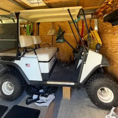 E-Z-GO Gas Golf Cart with Rear Utility Bed, Roof & Off-Road Tires -Keys Included - Howard City Off-Site