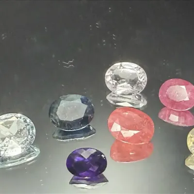 17.30 CTTW 8x5mm-10x8mm Gemstone Ovals Mystery Lot | Not Tested | Pink, Clear, Purple, Blue Tones