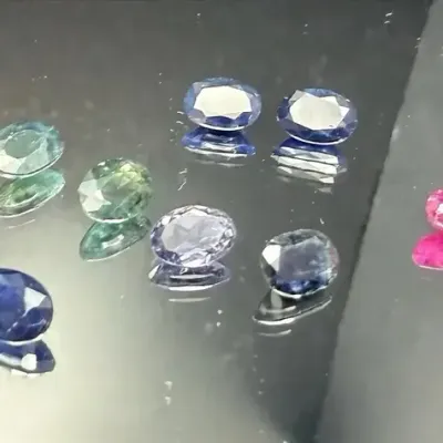 9.75 CTTW 6x4-11x8mm Gemstone Ovals & Cabochon Mystery Lot | Not Tested | Blue, Clear & Yellow Tones