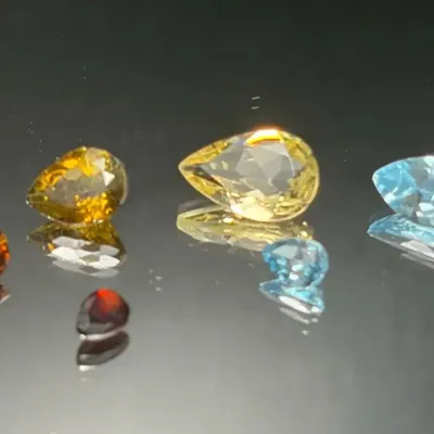 7.45 CTTW 6x4mm-11x8mm Pear-Shaped Gemstones Mystery Lot | Not Tested | Champagne, Blue, Brwn Tones