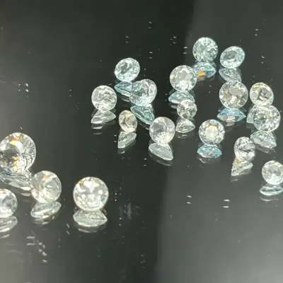 7.0 CTTW 3mm-5mm Gemstone Rounds Mystery Lot | Not Tested | Clear and Tinge of Blue Tones