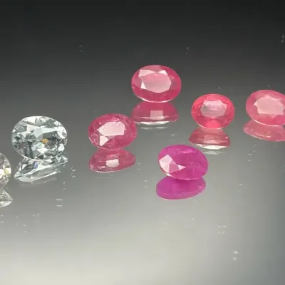 15.40 CTTW 7x5mm & 8x5mm Gemstone Ovals, 3 Matched Pairs | Not Tested | Clear and Red Tones