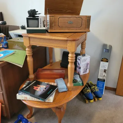 Sale Photo Thumbnail #86: Wooden record player, a small vintage television, and two wooden tables