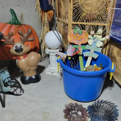 Sale Photo Thumbnail #146: Assorted holiday and garden decorations, including a plastic reindeer blow mold
