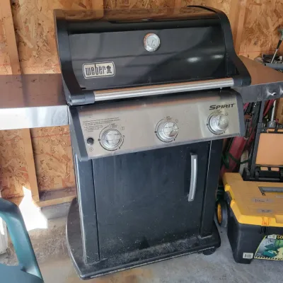 Sale Photo Thumbnail #230: Weber Spirit three-burner liquid propane gas grill