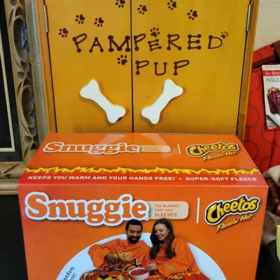 Sale Photo Thumbnail #102: Cheetos Flamin' Hot Snuggie blanket and a dog closet 