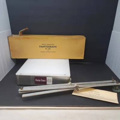 Vintage Porta-Trace light box paired with a metal precision pantograph No. 1290, complete with its original box and instruction sheet.