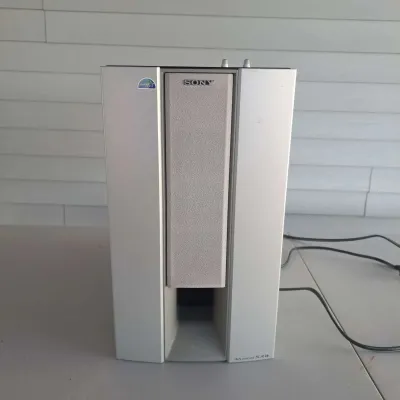 Sony Advanced S.A.W. active subwoofer in a silver finish, showing some light wear from use.
