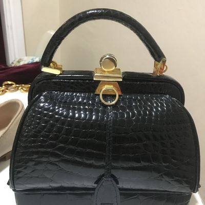 LANA MARKS
Crocodile Top Handle
007 Bag!


