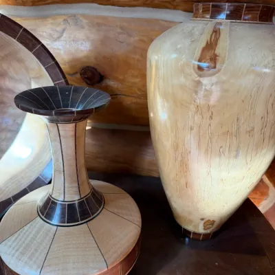 Sale Photo Thumbnail #4: Two handcrafted segmented wood vases with contrasting light and dark wood details, just two of a collection of turned wood pieces 
