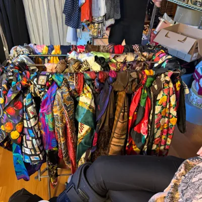 a ton of scarves including Hermes, Ralph Lauren,  silk, wool; and others
