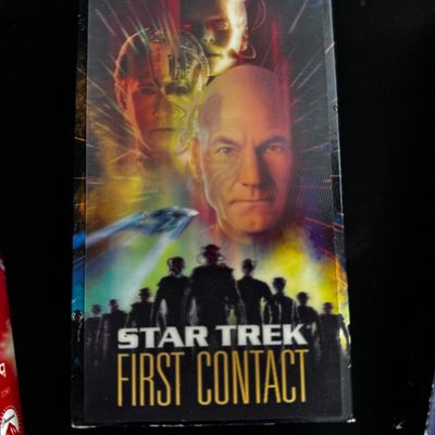 Sale Photo Thumbnail #22: Star Trek: First Contact VHS tape in its original slipcover case, featuring artwork of Captain Picard and the Borg.
