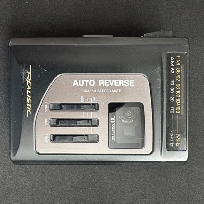 Sale Photo Thumbnail #58: Vintage Realistic Auto Reverse AM/FM Stereo Mate portable cassette player, featuring Dolby B NR and three-band equalizer sliders.