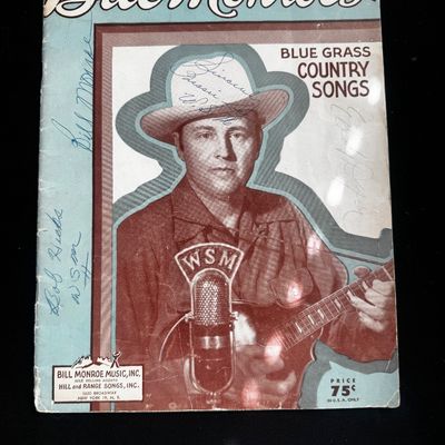 Sale Photo Thumbnail #47: Vintage Bill Monroe's Blue Grass Country Songs songbook, featuring multiple signatures on the cover including Bill Monroe and Bob Hicks.