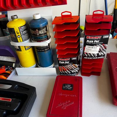 Sale Photo Thumbnail #76: Assorted workshop tools and accessories, including a Snap-on metric hex key set, Bernzomatic propane and MAPP gas cylinders, and Ernst Plier Pro organizers.
