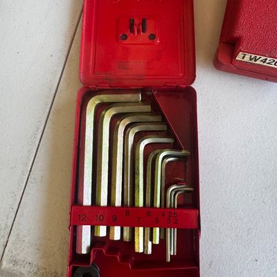Sale Photo Thumbnail #75: Vintage Snap-on metric hex key set in its original red metal index case, showing sizes 2 through 12.