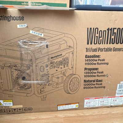 New in box Westinghouse WGen11500TFc Tri Fuel Portable Generator.