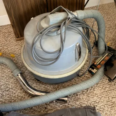 Sale Photo Thumbnail #57: Canister vacuum with hose & attachments