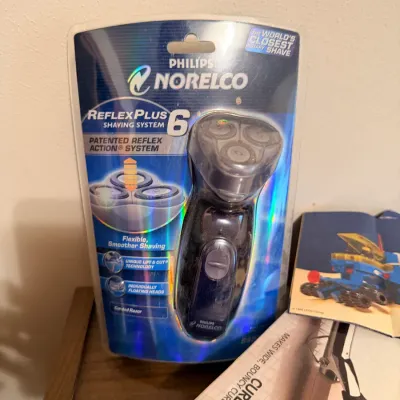 Sale Photo Thumbnail #68: Sealed Philips Norelco shaver, vintage boxed personal-care items