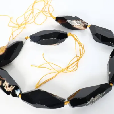 Sale Photo Thumbnail #154: RARE High Polish Large Black Silk Agate Bead
