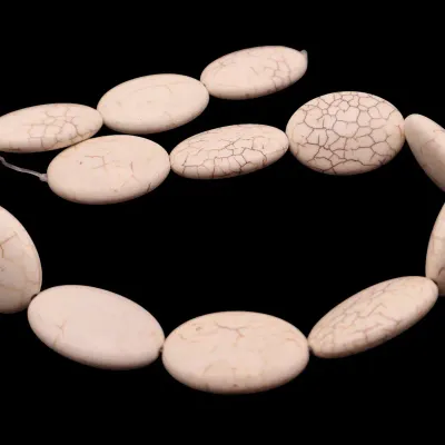 Sale Photo Thumbnail #134: 1 Stand Of Large Oval Ivory Howlite Beads
