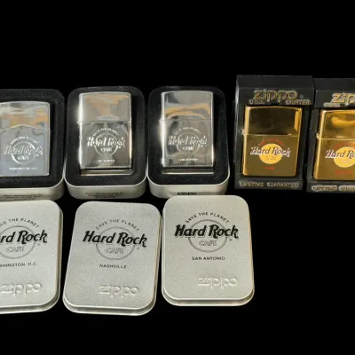 LH135HI - 5 Zippo Hard Rock Cafe Lighters – Paris, Nashville, San Antonio & More
