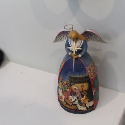 Sale Photo Thumbnail #2: Jim Shore Heartwood Creek angel figurine featuring a detailed nativity scene on her skirt, holding a star.