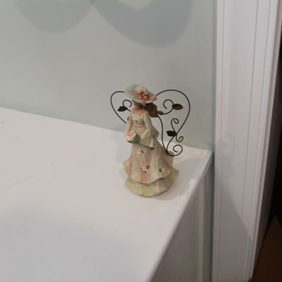 Sale Photo Thumbnail #8: Jim Shore Heartwood Creek angel figurine featuring a Victorian-style lady with a floral dress, wide-brimmed hat, and wire wings.