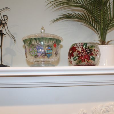 Sale Photo Thumbnail #28: Hand-painted Christmas glassware, including a lidded candy dish with ornament motifs and a votive holder featuring a poinsettia design.