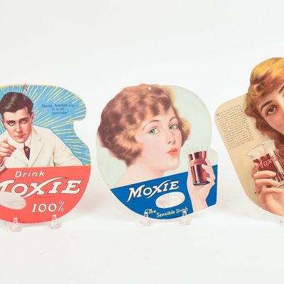 Sale Photo Thumbnail #138: Three Moxie Hand Fans, The Moxie Encyclopedia, and a Moxie Botttle.