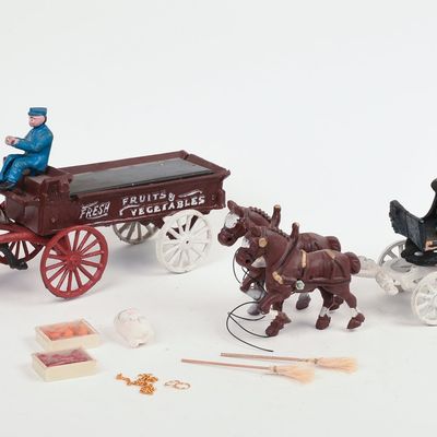 Sale Photo Thumbnail #88: Two Cast Iron Horse Drawn Wagons.