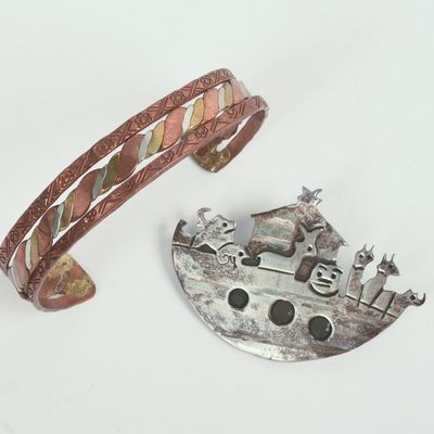 Sale Photo Thumbnail #107: Mexican Sterling Noahs Arch Brooch and a Mixed Metal Bracelet.