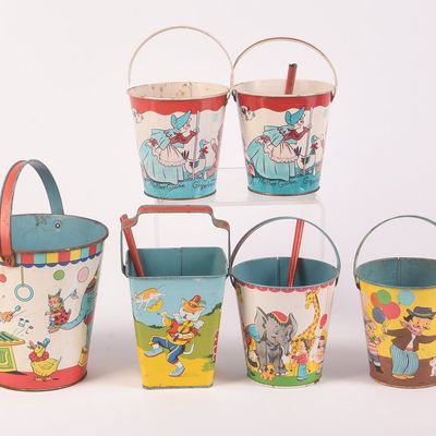 Nine Vintage Metal Children's Beach Pails.