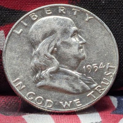 Sale Photo Thumbnail #303: 1954-D Franklin 90% Silver Half Dollar, (UNCIRCULATED) 72 years old