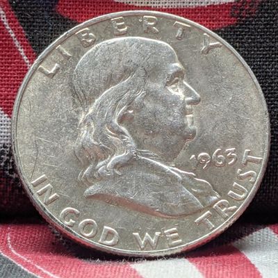 Sale Photo Thumbnail #323: 1963-D Franklin 90% Silver Half Dollar, (UNCIRCULATED) 63 years old