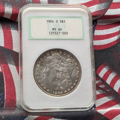 Sale Photo Thumbnail #283: 1904-O Morgan 90% Silver Dollar NGC MS 64 - 122 Years Old!