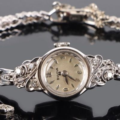 Sale Photo Thumbnail #417: BULOVA 14K WHITE GOLD WATCH W/ DIAMONDS & SAPPHIRE