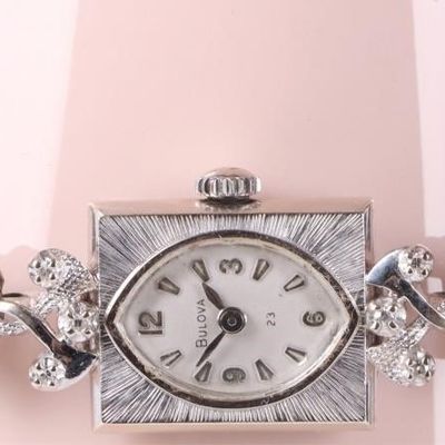 Sale Photo Thumbnail #114: 14K GOLD VINTAGE BULOVA DIAMOND WRISTWATCH